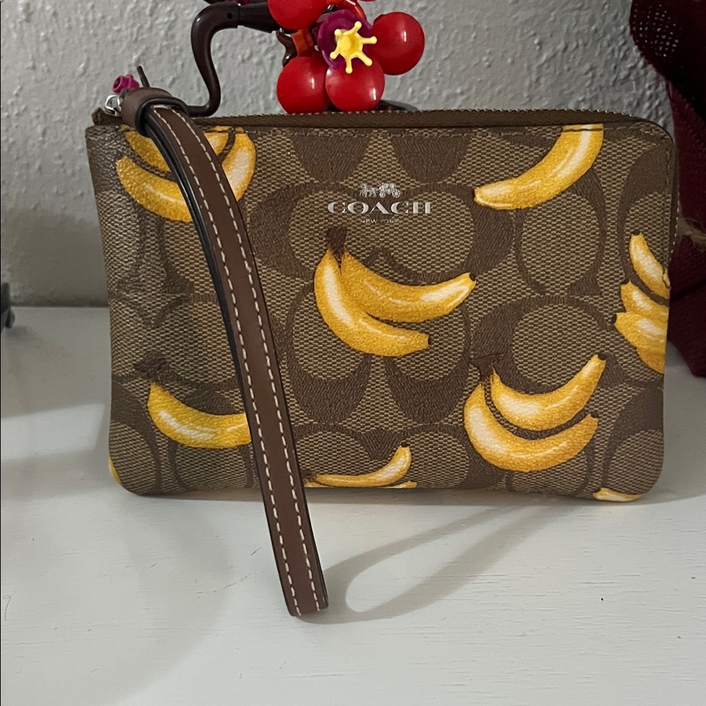 Coach Brown Signature Canvas Wristlet with Yellow Banana Print